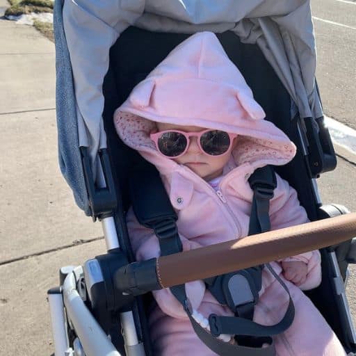 Sunglasses are a necessary accessory for newborn winter clothes.